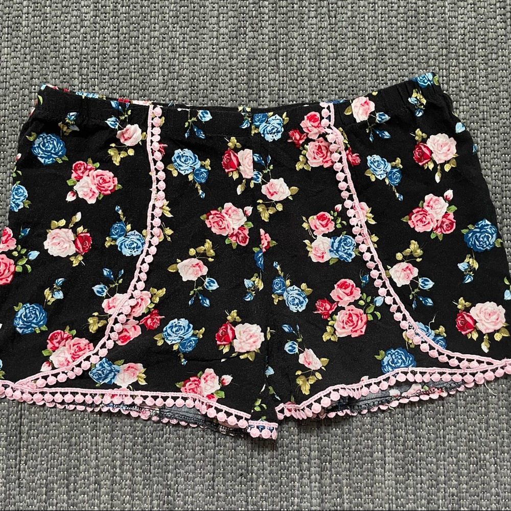 3/$10 
Women’s floral shorts